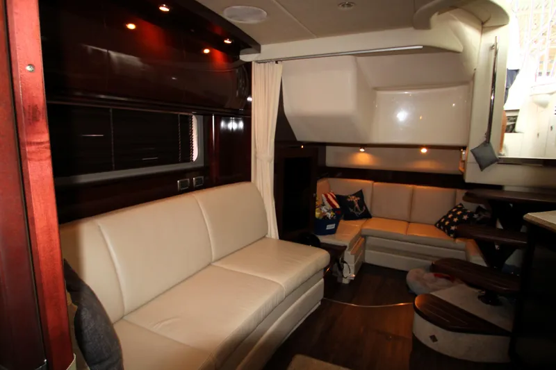 Slide: The Image of Luxurious interior of 2008 Sea Ray 38 Sundancer yacht with plush seating and elegant design. - 44