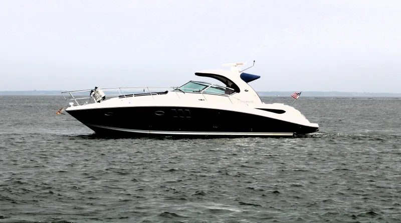 The Image of 2008 Sea Ray 38 Sundancer yacht cruising on open water. - 0