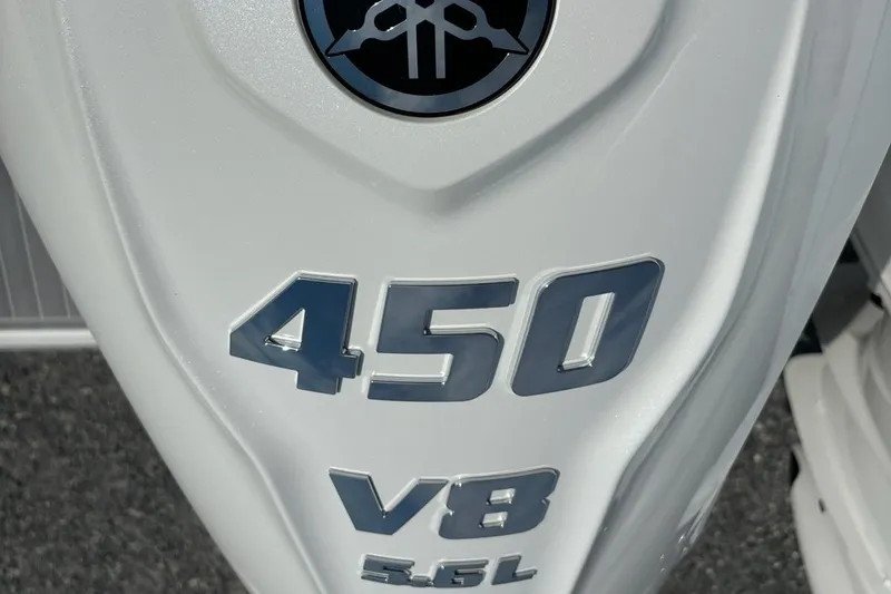 Slide: The Image of Close-up of 450 V8 5.6L engine badge on a 2026 Regal 36 XO. - 46
