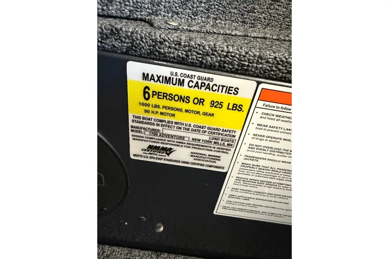 Slide: The Image of 2027 Lund 1700 Explorer Sport capacity label: 6 persons or 925 lbs, 90 HP motor. - 24