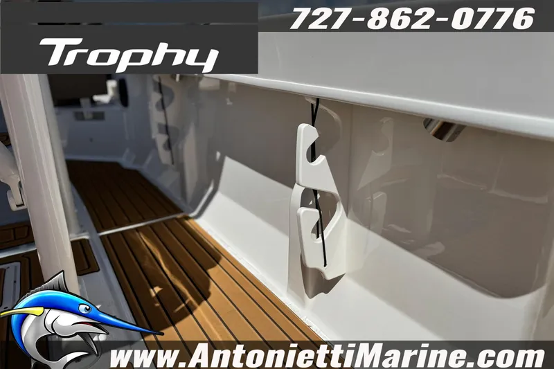 Slide: The Image of 2026 Bayliner Trophy T20CC boat interior with teak flooring, featuring Antonietti Marine branding. - 16