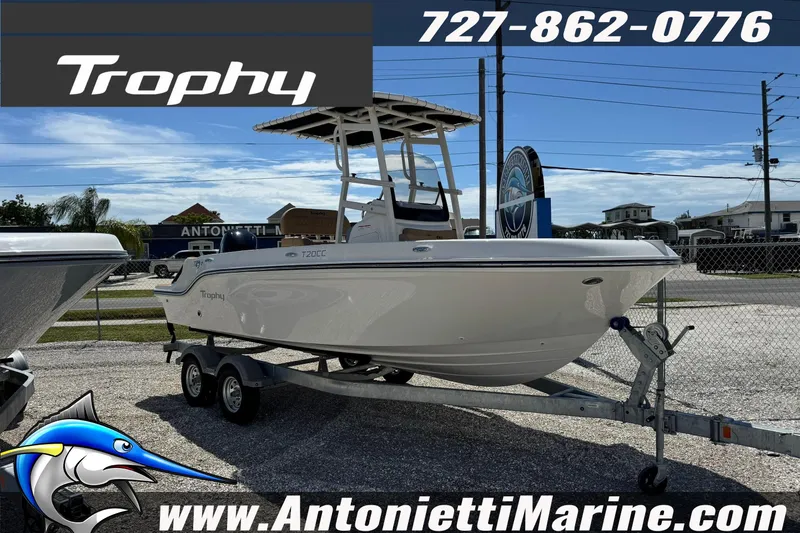 The Image of 2026 Bayliner Trophy T20CC boat on trailer at Antonietti Marine dealership. - 0