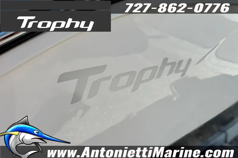 Slide: The Image of 2026 Bayliner Trophy T20CC boat branding with contact and website details. - 32
