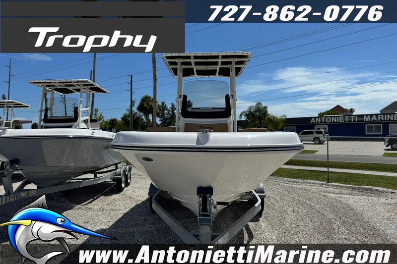Slide: The Image of 2026 Bayliner Trophy T20CC boat on trailer at Antonietti Marine dealership. - 2