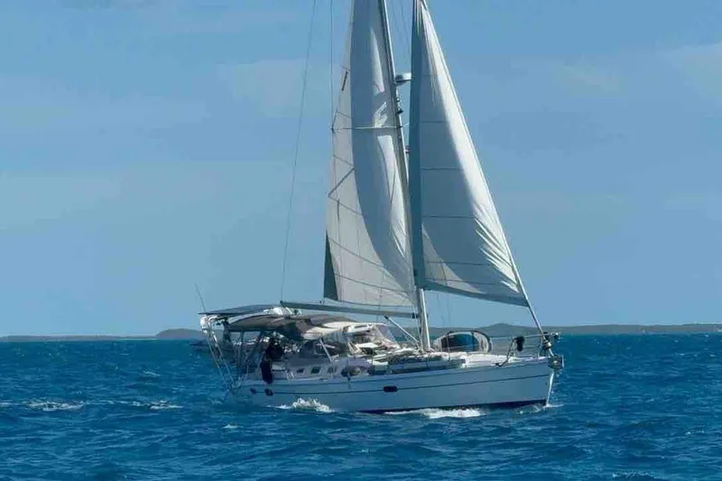 The Image of Sailing yacht Hunter 466 (2004) navigating blue ocean waters. - 1