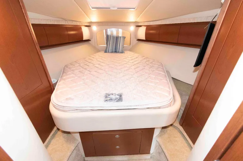 Slide: The Image of Luxurious cabin interior of 2007 Sea Ray 44 Sundancer yacht with cozy bed. - 17
