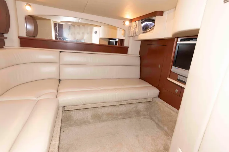 Slide: The Image of Luxurious interior of 2007 Sea Ray 44 Sundancer yacht with plush seating and entertainment system. - 20