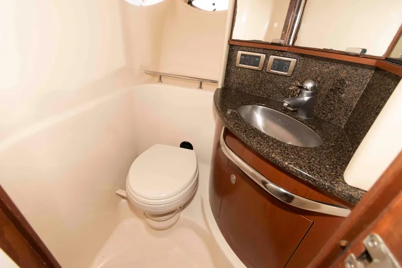 Slide: The Image of Luxurious 2007 Sea Ray 44 Sundancer yacht bathroom with modern sink and toilet. - 18