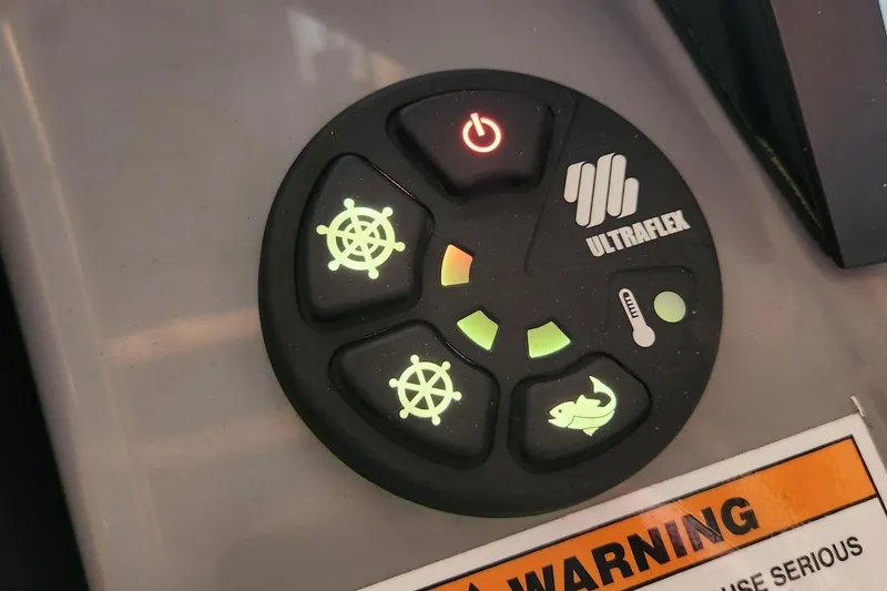 Slide: The Image of Illuminated control panel with symbols for navigation and fish finder. - 19