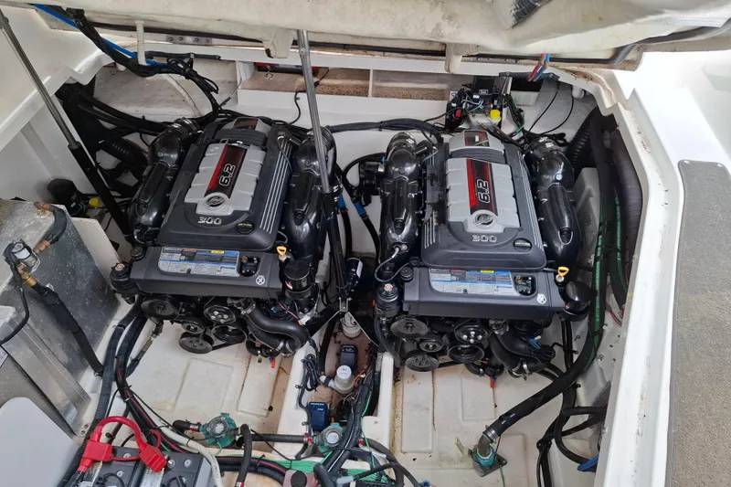 Slide: The Image of Engine compartment of a 2016 Sea Ray Sundancer 330 with twin 6.2L engines. - 24
