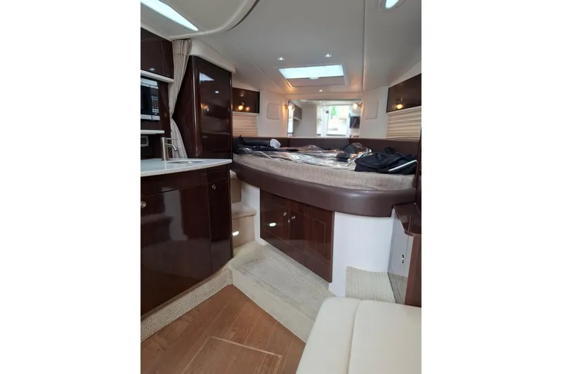 Slide: The Image of Luxurious interior of 2016 Sea Ray Sundancer 330 yacht with modern amenities and elegant design. - 20