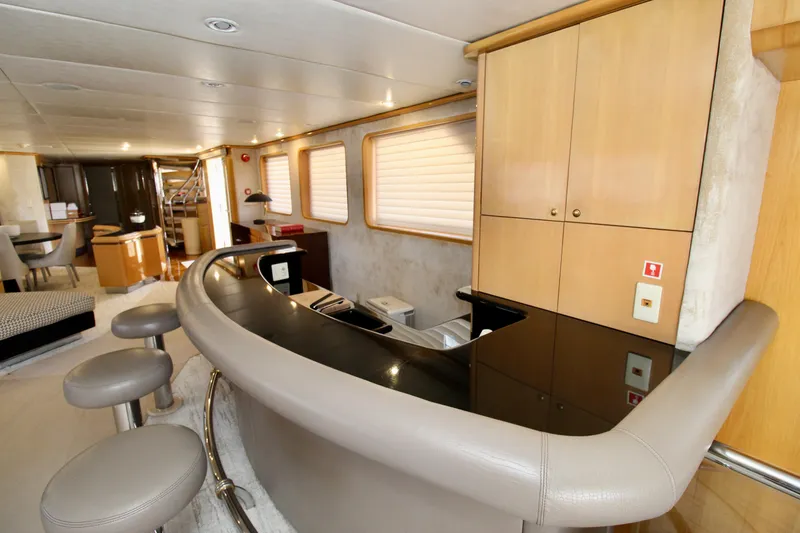 Slide: The Image of Luxurious interior of 1988 Sterling 137 yacht with modern bar and seating area. - 5