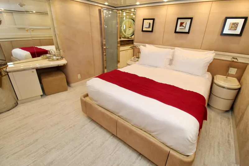 Slide: The Image of Luxurious 1988 Sterling 137 bedroom with elegant decor, red accents, and modern furnishings. - 14