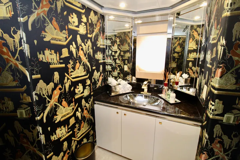 Slide: The Image of Luxurious 1988 Sterling 137 bathroom with ornate wallpaper and elegant fixtures. - 16