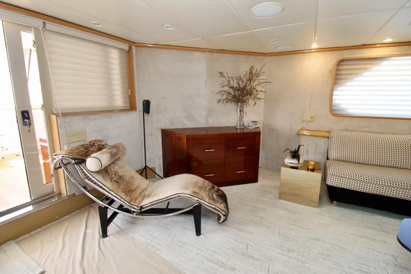 Slide: The Image of Luxurious interior of a 1988 Sterling 137 yacht with modern furnishings and elegant decor. - 4