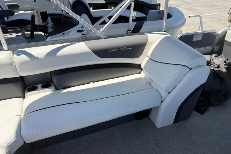 Slide: The Image of Luxurious seating on a 2022 South Bay 224CR2 pontoon boat with cup holders. - 15