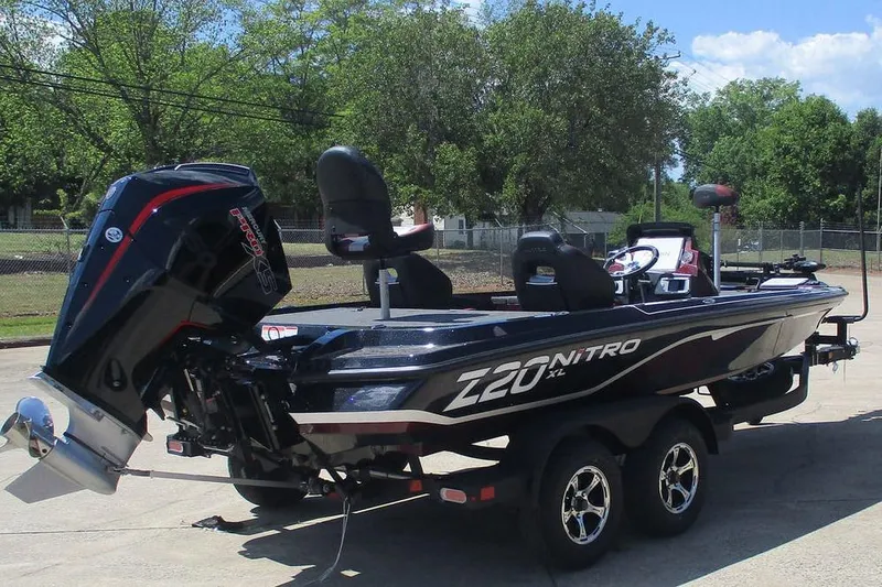 Slide: The Image of 2026 Nitro Z20 XL Pro boat on trailer, featuring sleek design and powerful engine. - 2