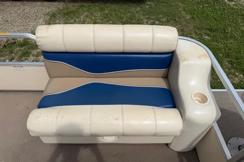 Slide: The Image of 2004 Sweetwater Challenger 200 RE-4 Gate boat seat with blue and beige upholstery. - 10