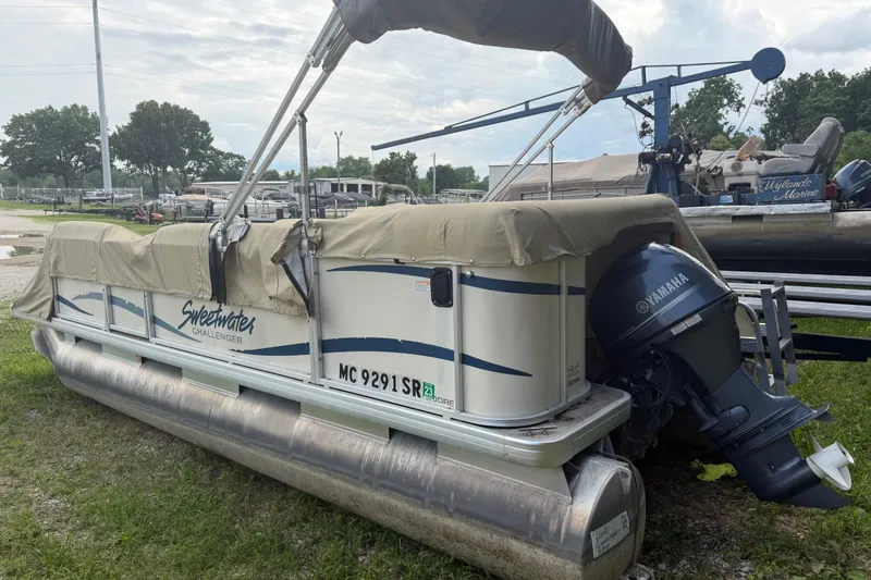 Slide: The Image of 2004 Sweetwater Challenger 200 RE-4 Gate pontoon boat with Yamaha outboard motor. - 3