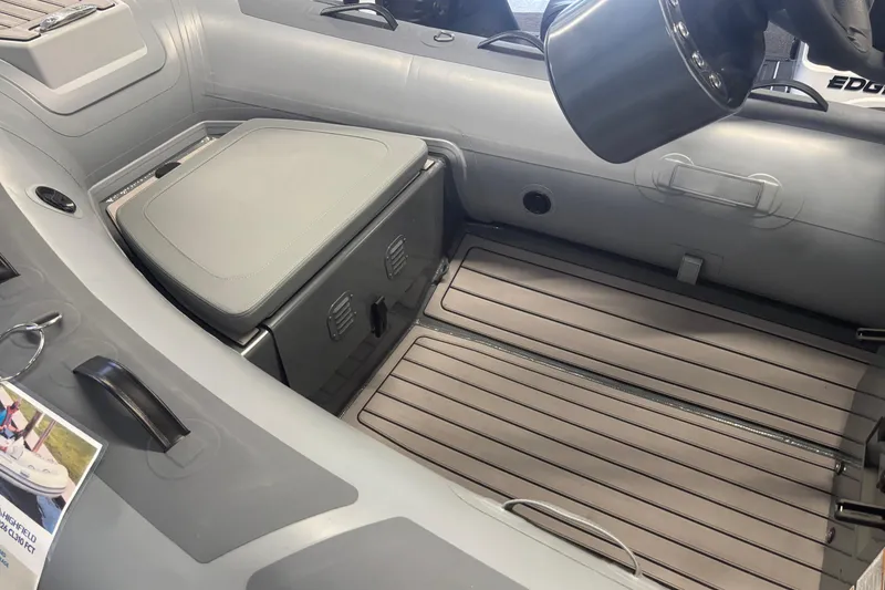 Slide: The Image of 2026 Highfield Classic 310 FCT interior with cushioned seating and sleek design. - 4