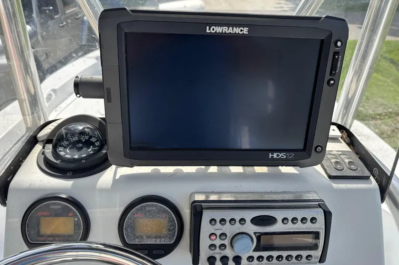 Slide: The Image of Control panel of a 2006 Ranger 2200 Bay Ranger with Lowrance HDS12 display. - 8