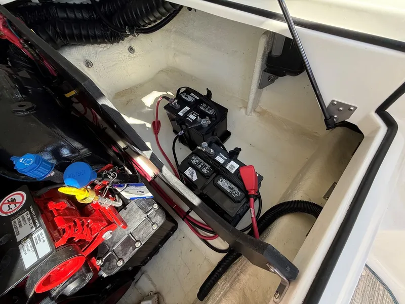 Slide: The Image of Batteries in the engine compartment of a 2019 Regal 23 RX Bowrider. - 40