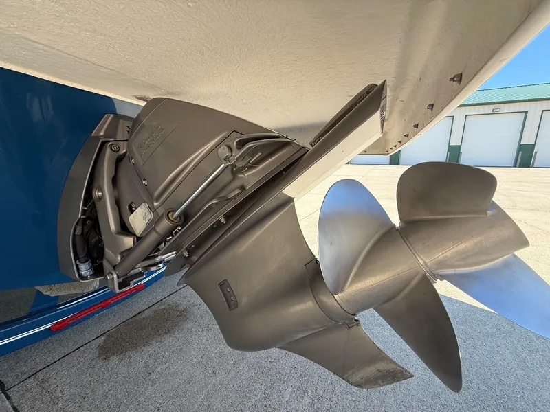 Slide: The Image of Close-up of a boat propeller and drive system on a 2019 Regal 23 RX Bowrider. - 8