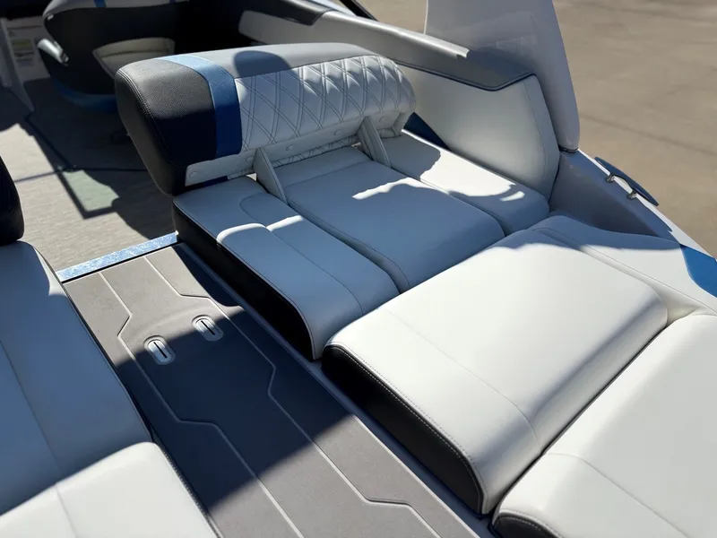 Slide: The Image of The image shows the luxurious seating of a 2019 Regal 23 RX Bowrider. - 33