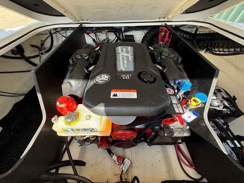 Slide: The Image of Engine compartment of a 2019 Regal 23 RX Bowrider with a 300 HP V8 engine. - 39