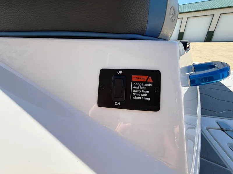 Slide: The Image of Close-up of a control switch on a 2019 Regal 23 RX Bowrider. - 37
