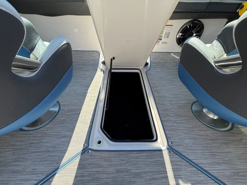 Slide: The Image of Interior of a Regal 23 RX Bowrider with floor storage compartment. - 36
