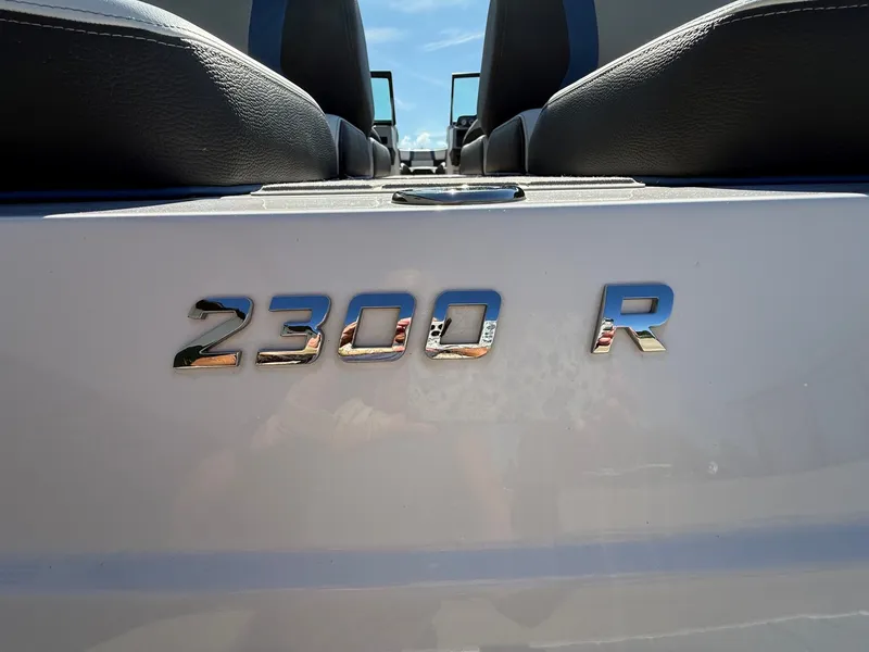 Slide: The Image of 2019 Regal 23 RX Bowrider with sleek design and comfortable seating. - 6