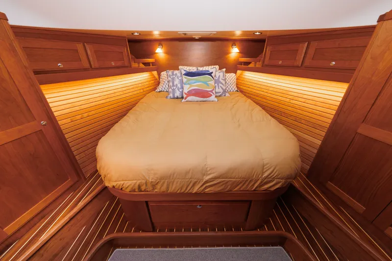 Slide: The Image of Luxurious cabin interior of 2024 Sabre 48 Salon Express yacht with cozy bedding. - 31