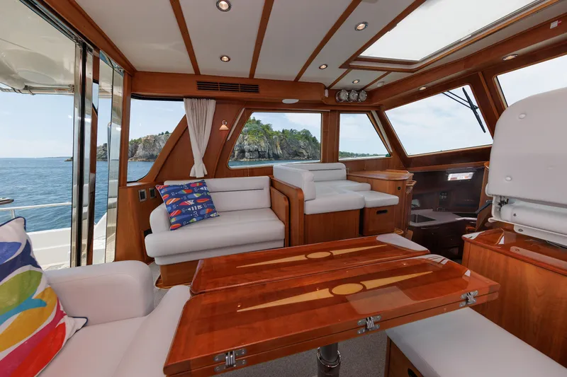 Slide: The Image of Luxurious interior of 2024 Sabre 48 Salon Express yacht with scenic ocean view. - 24