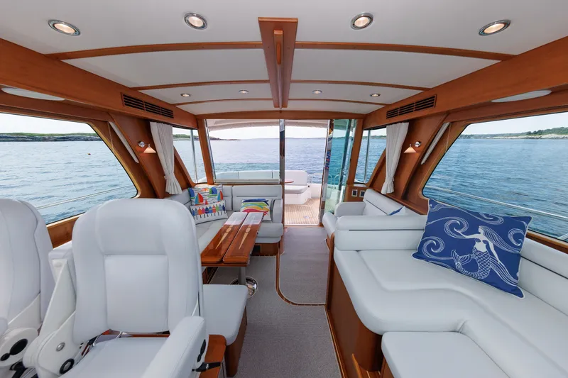 Slide: The Image of Luxurious interior of 2024 Sabre 48 Salon Express yacht with ocean view. - 18
