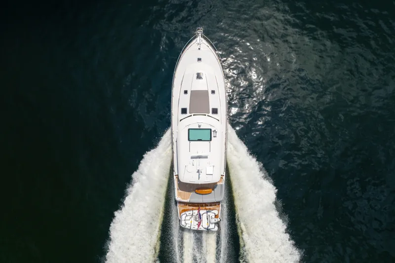 Slide: The Image of Aerial view of 2024 Sabre 48 Salon Express yacht cruising on water. - 1