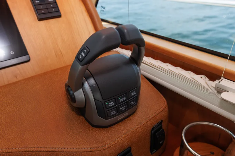 Slide: The Image of Throttle control on 2024 Sabre 48 Salon Express yacht, featuring ergonomic design and advanced controls. - 30