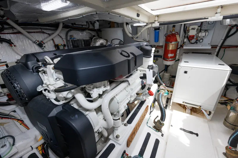Slide: The Image of Engine room of 2024 Sabre 48 Salon Express yacht, featuring modern equipment and systems. - 39