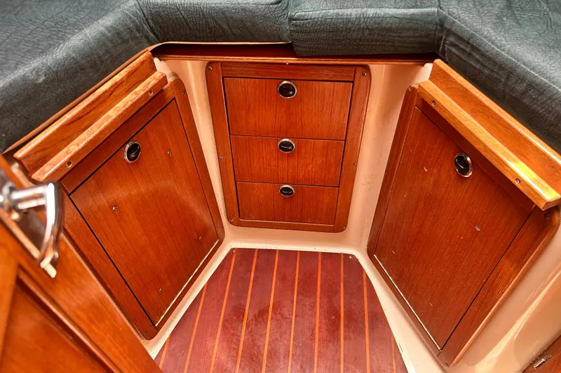 Slide: The Image of Interior of 1998 Catalina 36 MkII sailboat with wooden cabinetry and cushioned seating. - 71
