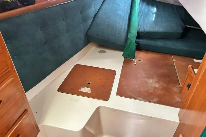 Slide: The Image of Interior cabin of a 1998 Catalina 36 MkII sailboat with seating and storage. - 46