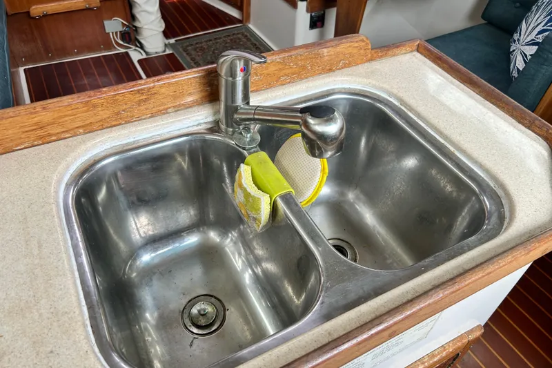 Slide: The Image of Stainless steel double sink in 1998 Catalina 36 MkII yacht galley. - 40