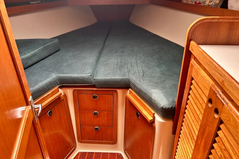 Slide: The Image of Cozy cabin interior of 1998 Catalina 36 MkII sailboat with wooden cabinetry. - 75
