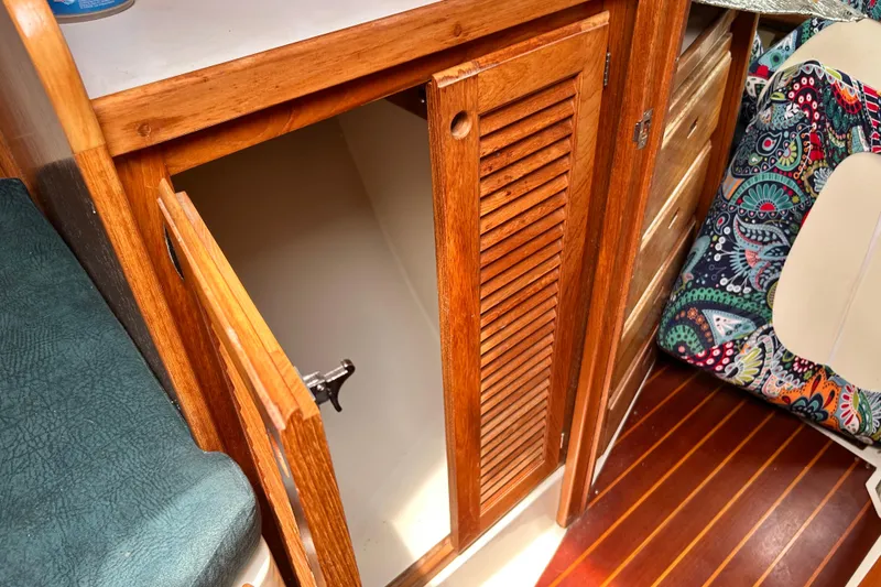 Slide: The Image of Wooden cabinet interior on a 1998 Catalina 36 MkII sailboat. - 73