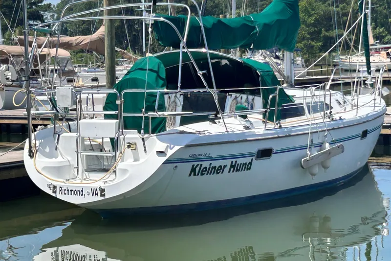 Slide: The Image of 1998 Catalina 36 MkII sailboat docked, green covers, named "Kleiner Hund," Richmond, VA. - 5