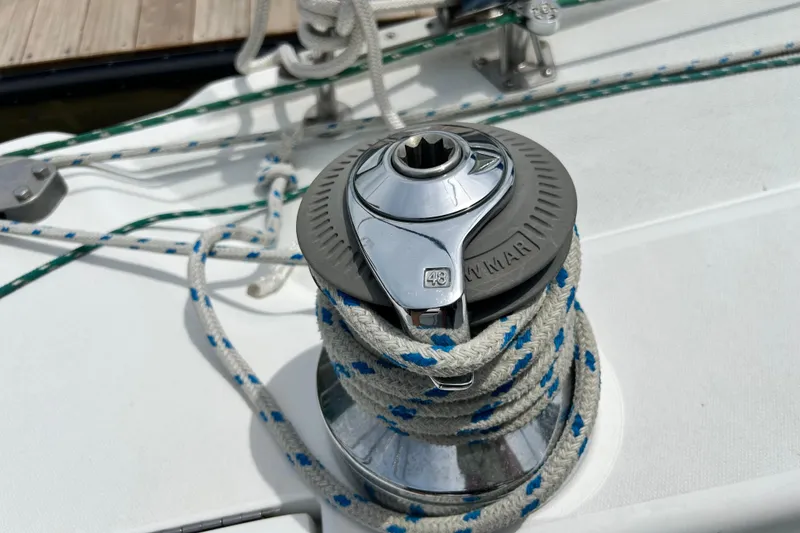 Slide: The Image of Winch on 1998 Catalina 36 MkII sailboat with rope coiled around it. - 18