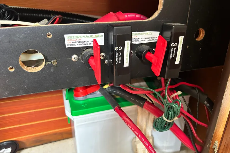 Slide: The Image of Electrical panel with switches and wiring on a 1998 Catalina 36 MkII sailboat. - 81