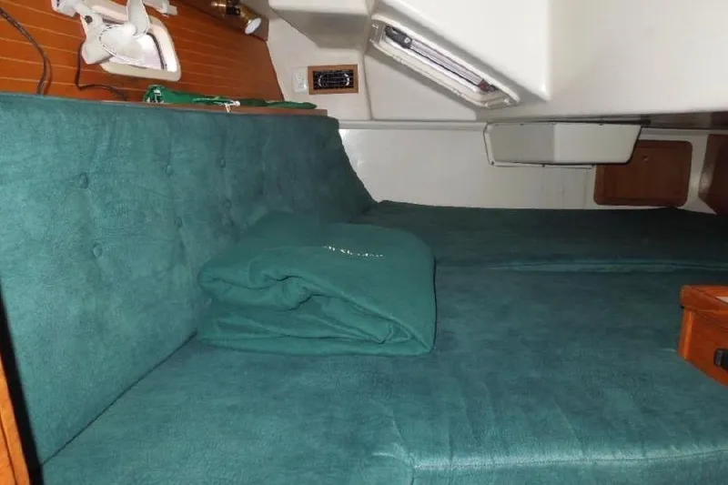 Slide: The Image of Interior cabin of a 1998 Catalina 36 MkII sailboat with green upholstery. - 76