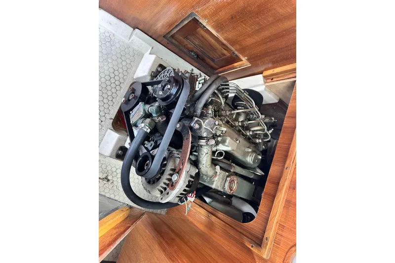 Slide: The Image of Engine of a 1998 Catalina 36 MkII sailboat, showcasing mechanical components. - 37