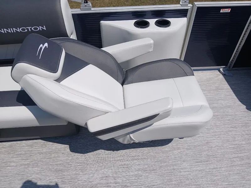 Slide: The Image of A luxurious, cushioned seat with armrests on a boat. - 16
