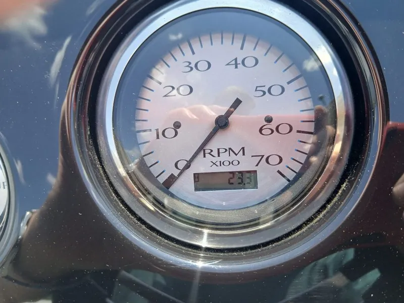 Slide: The Image of A tachometer displays 23.1 revolutions per minute. - 6